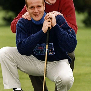 Colin Clark playing golf with Darren Anderton