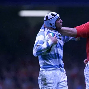 Craig Quinell and Lucas Ostiglia come to blows in October 1999 during the Wales v