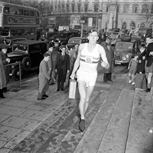 Roger Bannister arrives at St Martins in the Field with a red dispatch box. December 1952