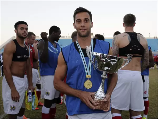Sam Baldock of Bristol City Holds the Friendship Cup After Victory Against Extension Gunners in Botswana, 2014