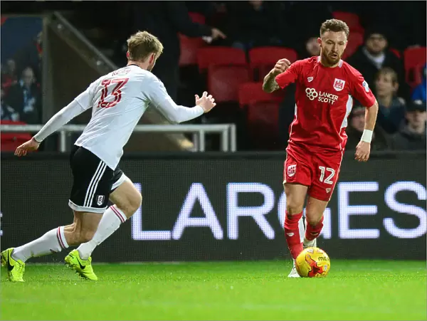 Bristol City's Matty Taylor Charges Forward Against Fulham in Sky Bet Championship Clash