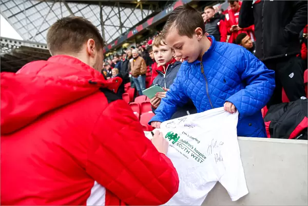 Bristol City's Jens Hegeler Signs Shirt for CHSW at Ashton Gate