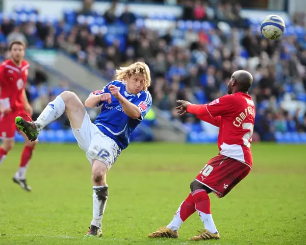 Bristol City FC: Peterborough's Mackail-Smith Clears the Ball in Championship Clash (March 2010)