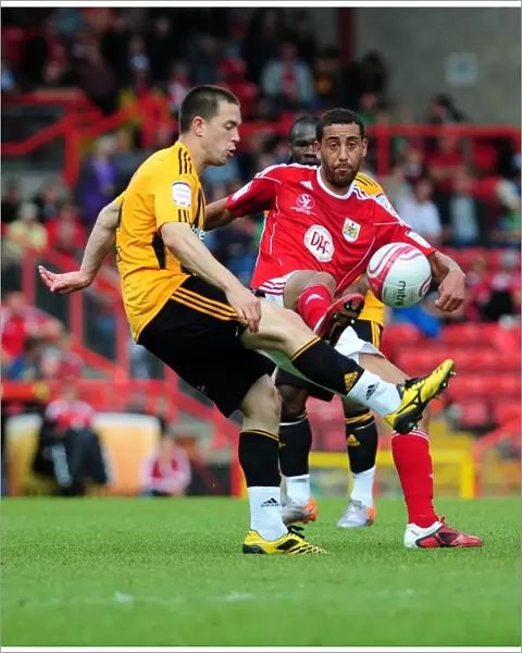 Bristol City vs Hull City: Lewin Nyatanga's Battle for the Ball - Championship Match, May 2011