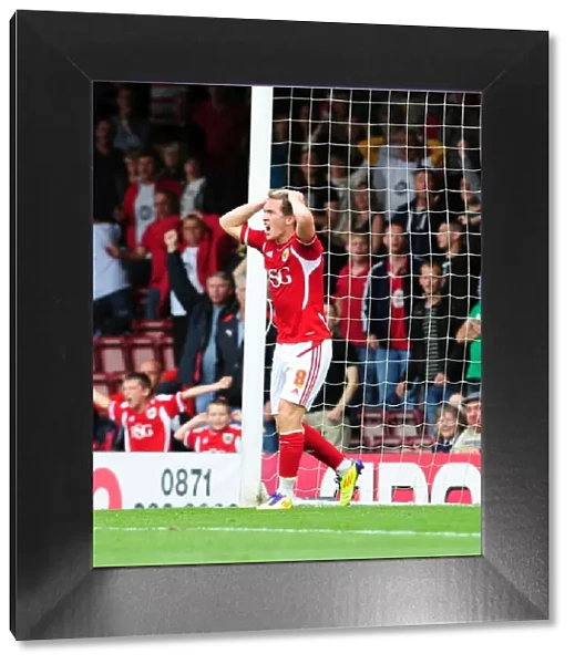 Disallowed Goal: Neil Kilkenny's Frustration at Ashton Gate as Bristol City vs. Portsmouth Championship Match Goal is Disallowed (2008-11)
