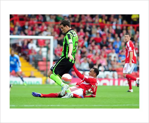 Bristol City's Nicky Maynard vs Brighton's Lewis Dunk: Intense Championship Tackle, September 10, 2011 - Editorial Use Only