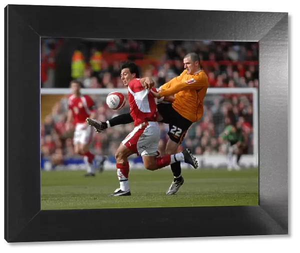 Bristol City's Nick Carle Fights for Possession Against Hull City