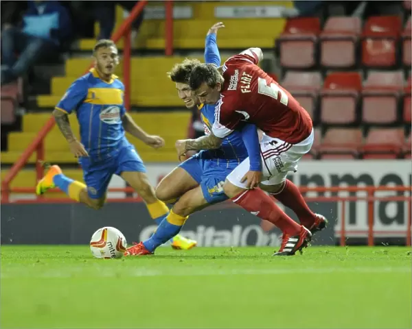 Aden Flint Fouls Tom Bradshaw in Bristol City vs Shrewsbury Town Football Match, September 13, 2013