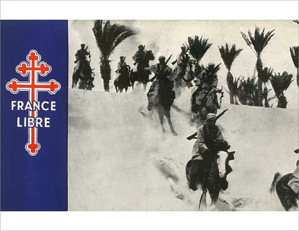 WW2 - Free French Spahis riding through the desert dunes