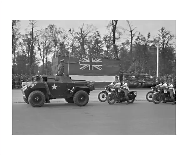 Military parade with jeep and motorbikes