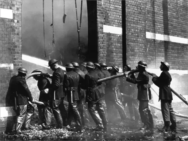 Crew of firefighters in action, WW2