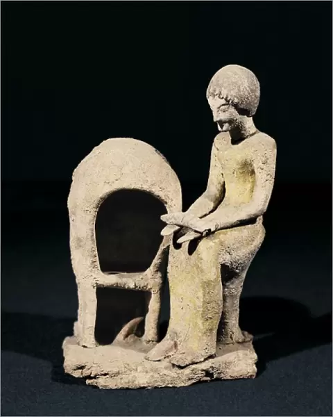 Figure of Woman next to an Oven. ca. 1550 BC - 1100