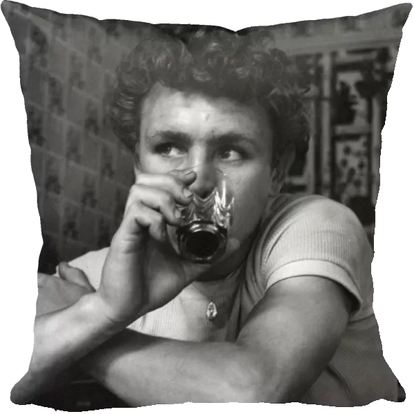 Young man drinking in a cafe