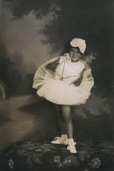 Studio portrait, little girl in ballerina costume