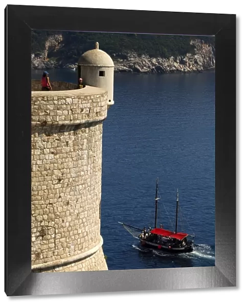 Sailboat sailing in Adriatic Sea, near the wall of Dubrovnik