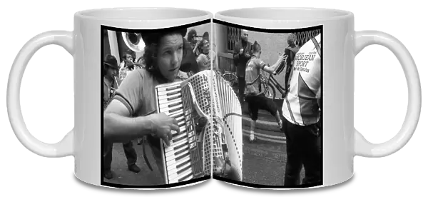 Accordian player - street musicians, London, England