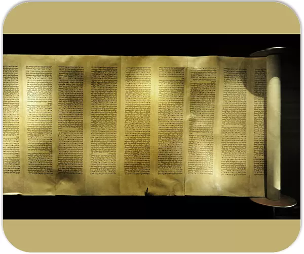 The Torah scroll. It contains the Pentateuch (Five Books of