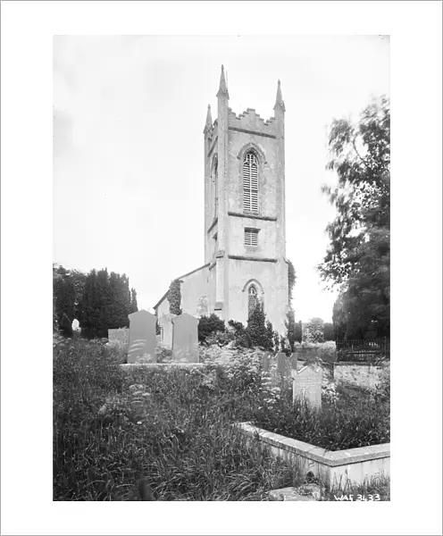 A low view of a Church from the graveyard