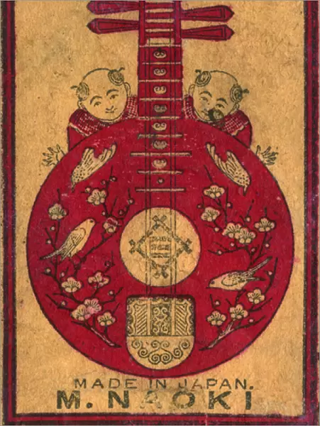 Old Japanese Matchbox label with a red mandolin with birds