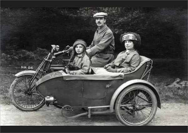 Family of three on a 1907  /  8 Matchless motorcycle & sidecar