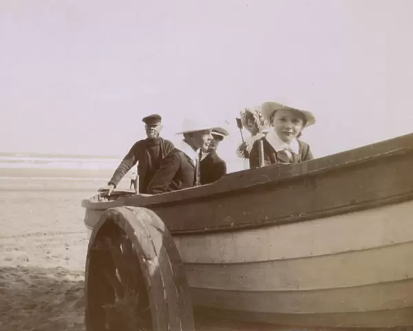Four children and boatman, Saltburn, North Yorkshire
