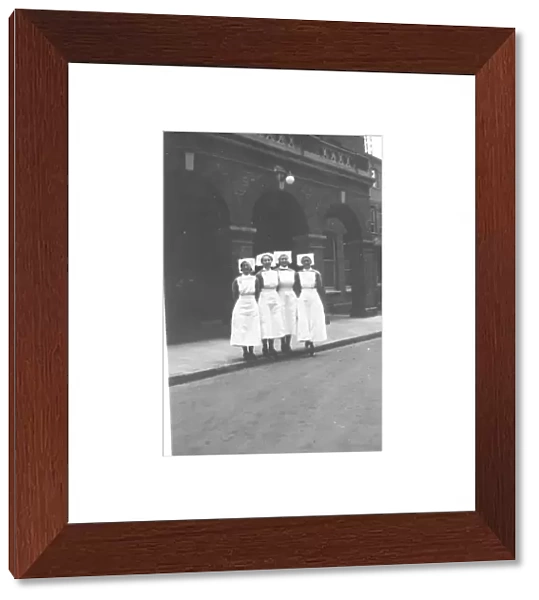 Four sisters at the entrance to Highgate Hospital