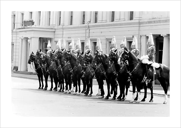 London horseguards on horseback in ceremonial uniform. Date: circa 1960s
