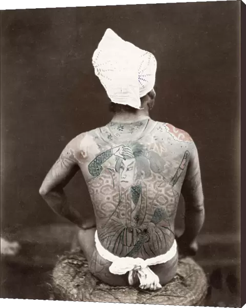 Jpan, man with extensive ornate tattoo, tattooing