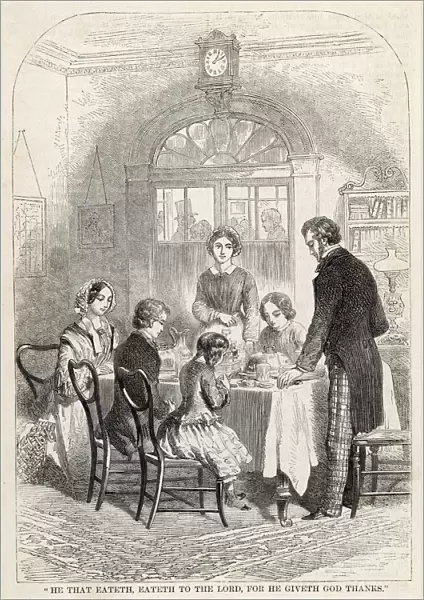 Victorian family saying grace before dinner