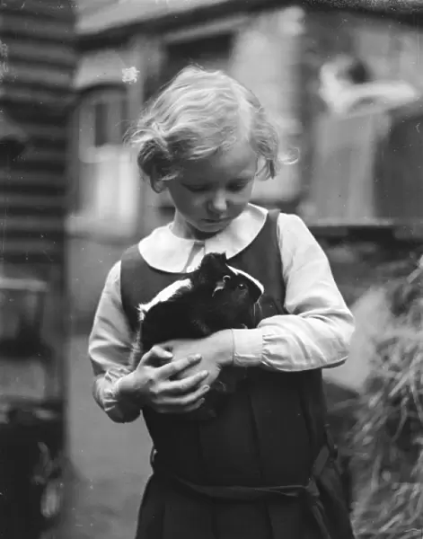 Girl and Pet Guinea Pig - 1