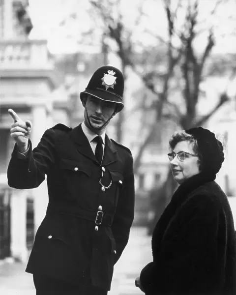 Policeman Directs Lady