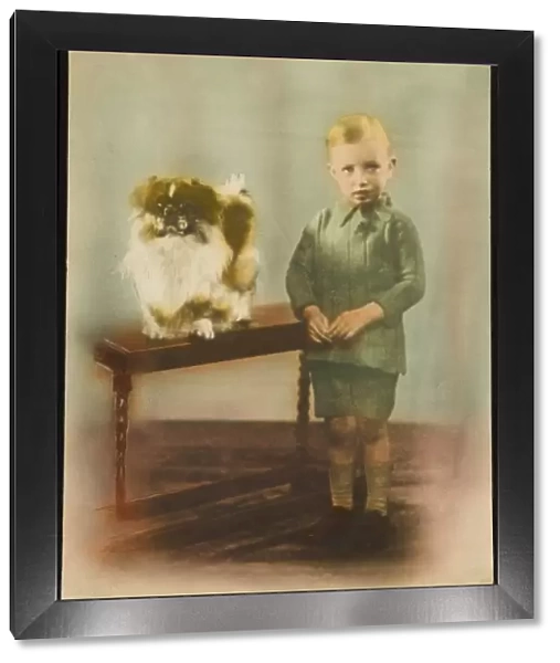 Young Boy and Pekingese