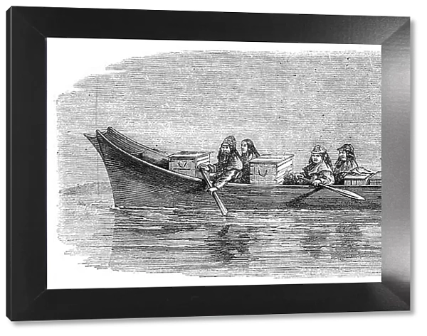 Native American Indians in a large canoe, c. 1862