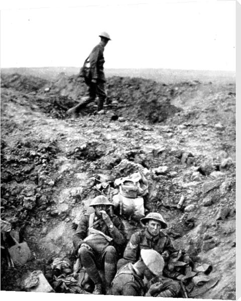 New Zealand soldiers resting in shell-hole