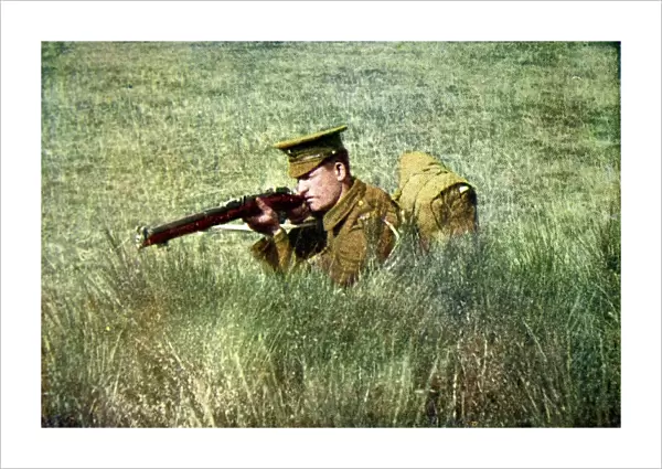 A British infantryman kneeling behind cover