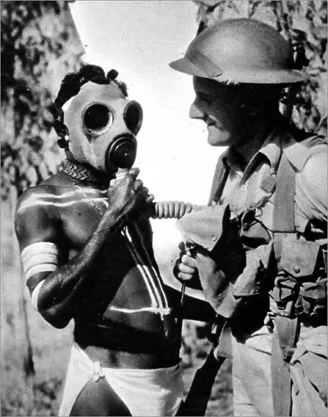 Aborigine trying on a Gas Mask, Australia, Second World War
