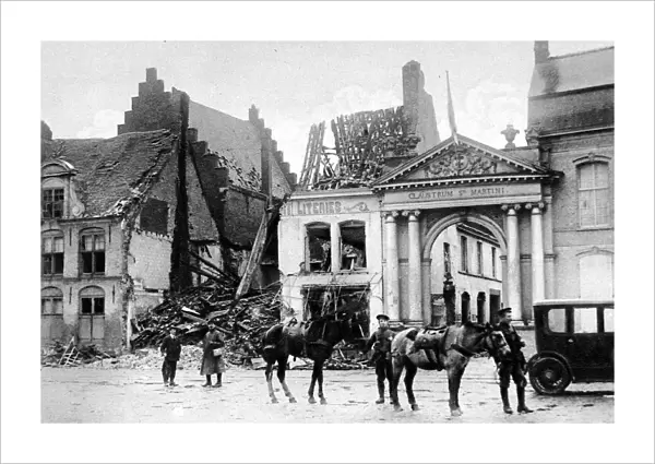 The former capital of West Flanders damaged by German shells: A house wrecked next to the claustrum St