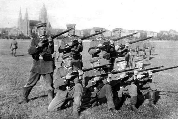 Germanys reply to Kitcheners army: Volunteers (Freiwillige) at drill for entry into the field in