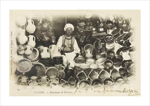 Tunisian potter in his shop