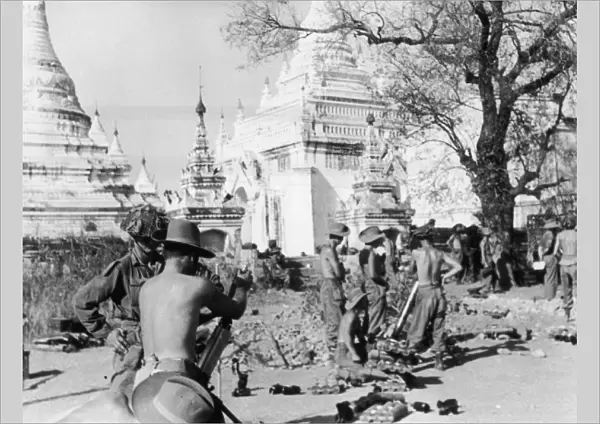 Firing mortars over pagodas at Meiktila, Burma