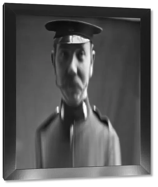 Fancy portrait of a soldier in a distorting mirror
