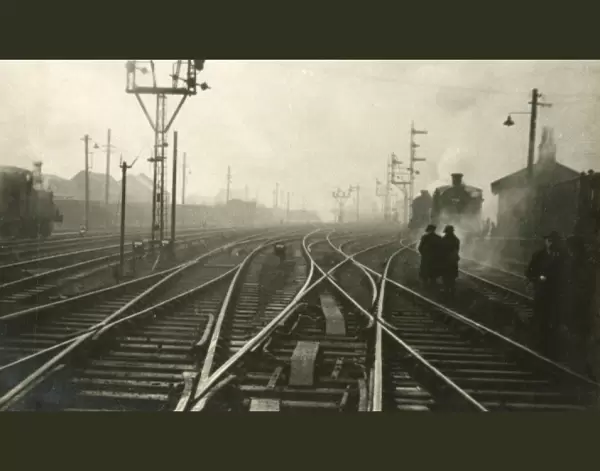 Railway junction in the morning mist
