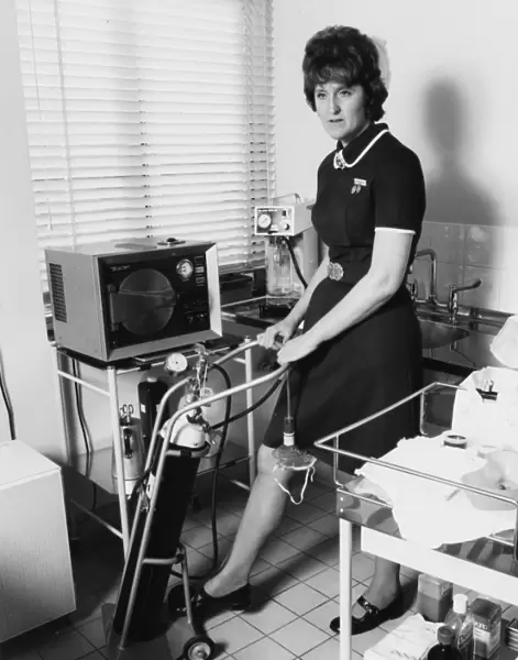 Nurse with equipment at the Medical Centre, Hendon