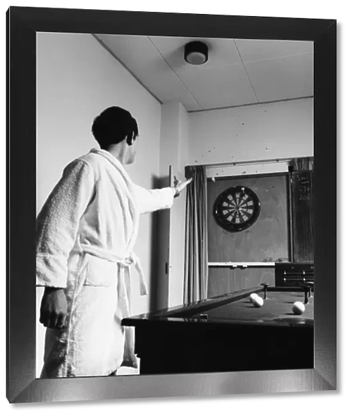 Patient playing darts, Medical Centre, Hendon