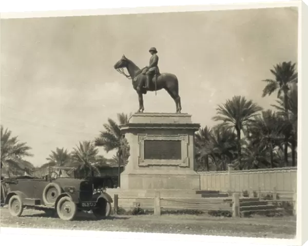 Car in front of equestrian statue, Middle East