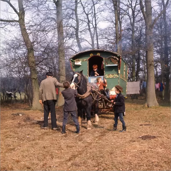 Gipsies with horse-drawn caravan