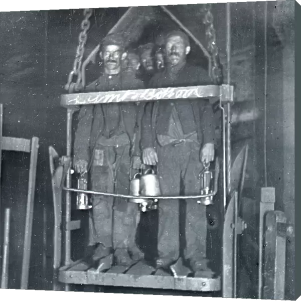 Coal miners in shaft lift, South Wales