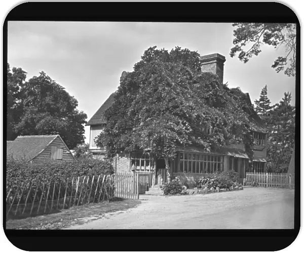 Unidentified house on a country lane