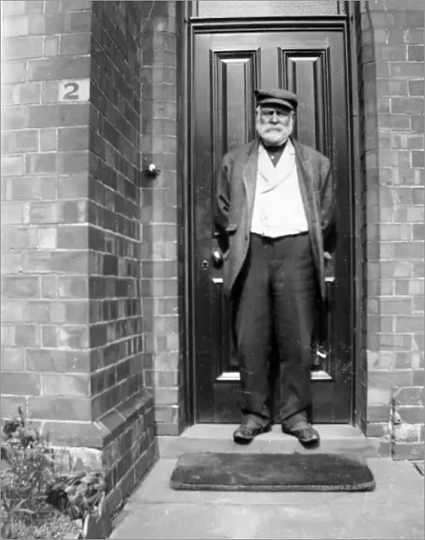 Edwardian workman on his front doorstep, Pembrokeshire