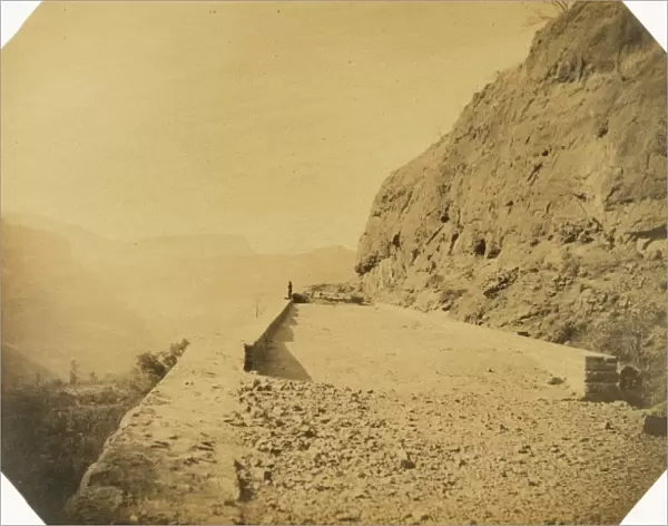 Railway viaduct and retaining walls on rock escarpment